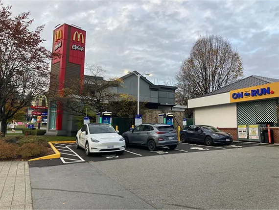 EV charging location next to ON the RUN. McDonald's in the background.